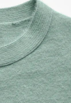 Pull en fil de plume