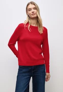 Pull avec détail de boutons