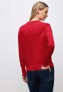 Pull avec détail de boutons