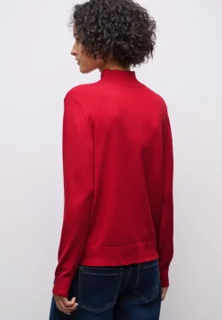 Pull à col tourbillon
