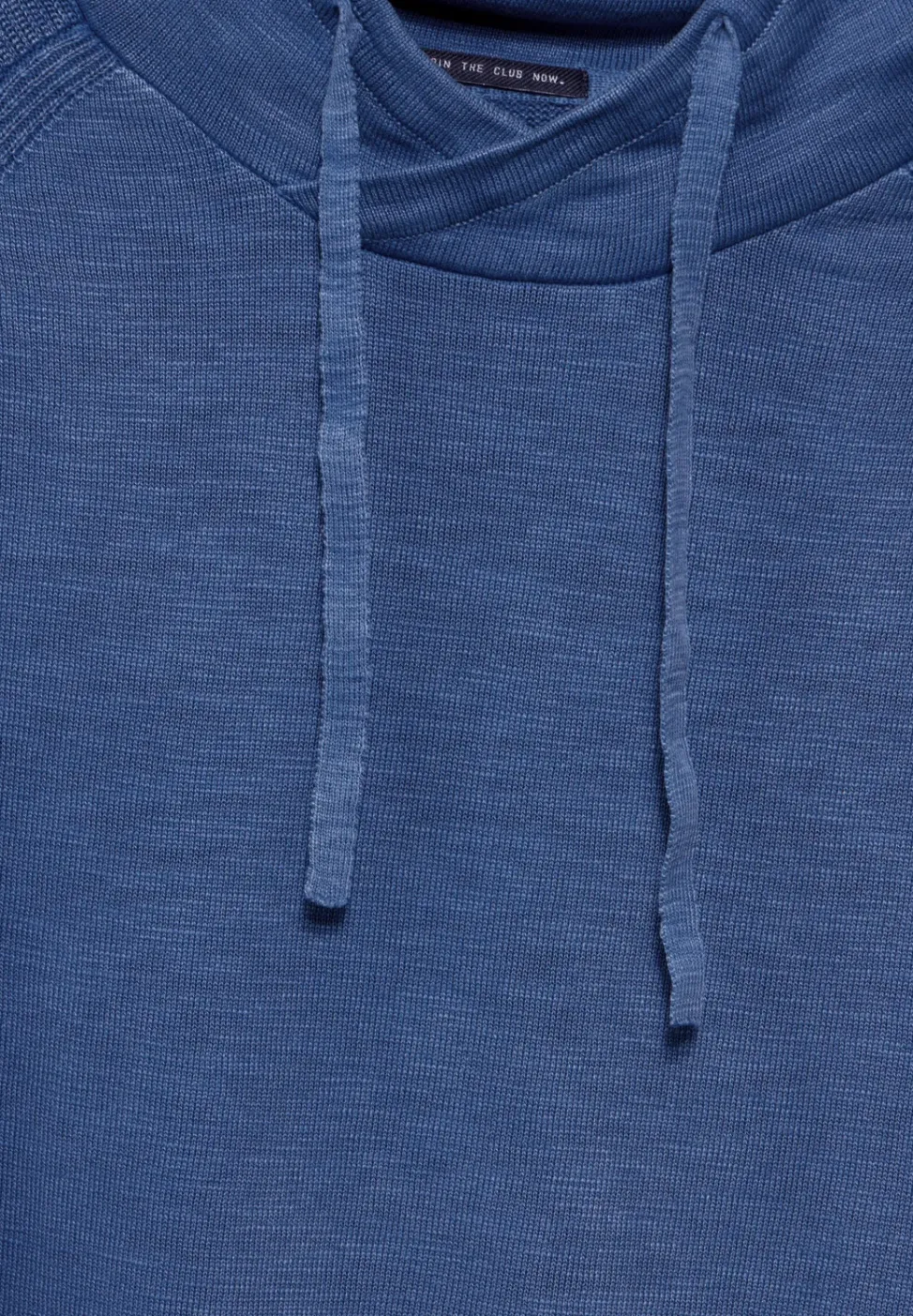 Pull à l'aspect délavé