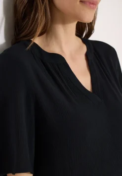 Robe à longueur de genou en structure crêpe