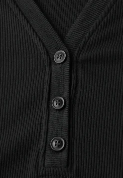 Robe polo avec structure côtelée