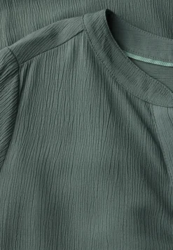 Robe structurée avec volants