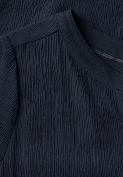 Robe structurée avec volants