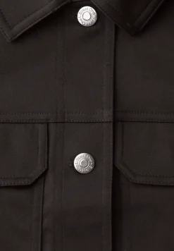Survêtement au look slik avec patte de boutonnage