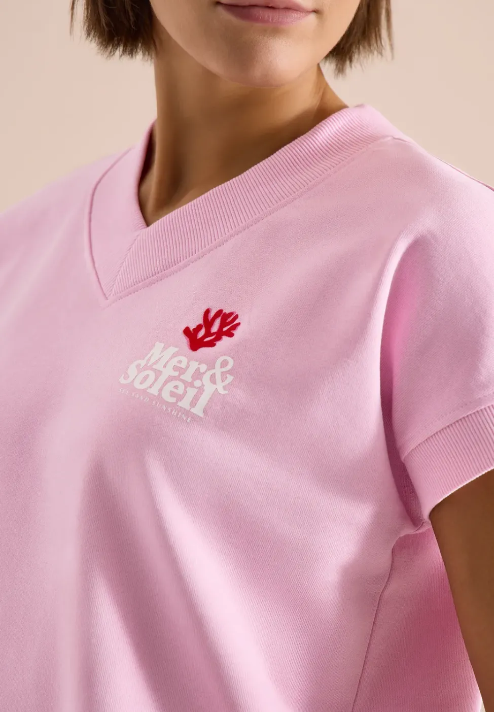 Sweat-shirt à manches courtes imprimé au dos