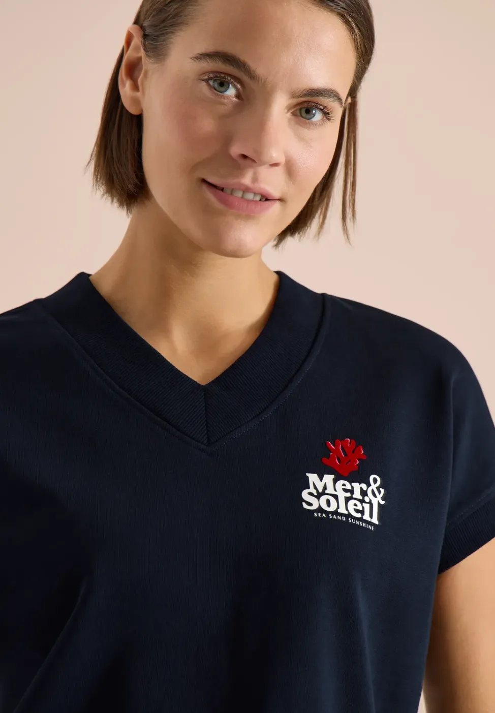 Sweat-shirt à manches courtes imprimé au dos