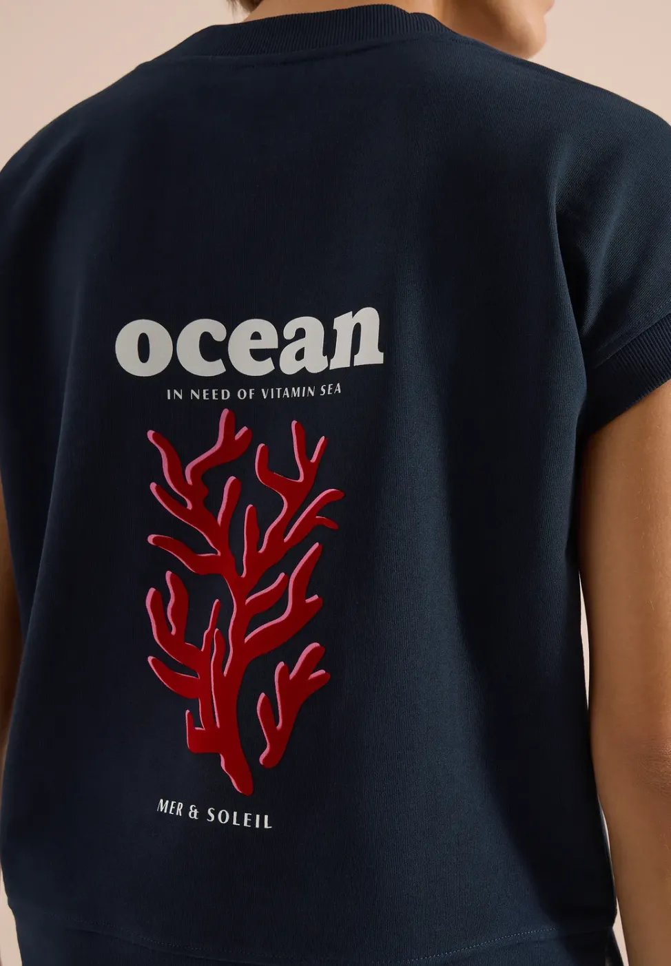 Sweat-shirt à manches courtes imprimé au dos
