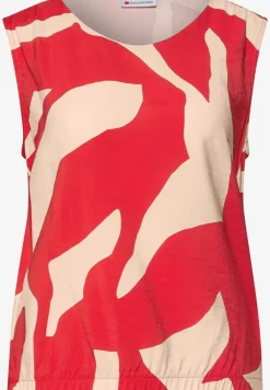 Top à motifs en matière mélangée