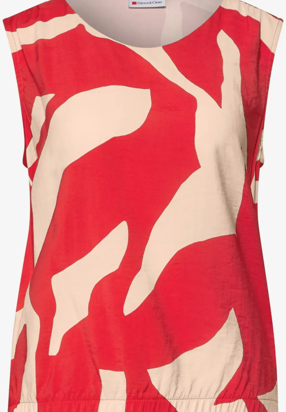 Top à motifs en matière mélangée