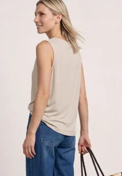 Top aspect soyeux avec décolleté cascade