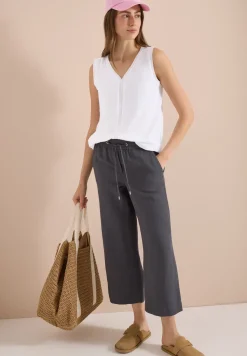 Top avec col en V et bande crocheté