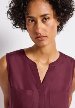 Top chemisier avec poches poitrine