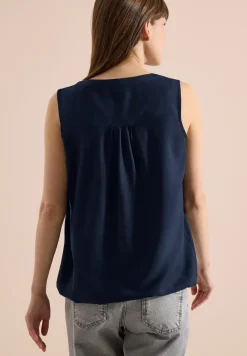 Top chemisier avec split neck et rubans