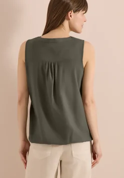 Top chemisier avec split neck et rubans