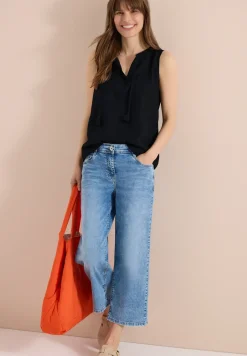 Top chemisier avec split neck et rubans