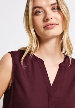 Top chemisier en couleur unie