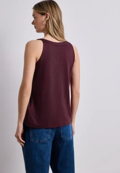Top col V à détail anneaux