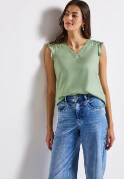 Top col V avec détails au crochet