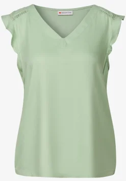 Top col V avec détails au crochet