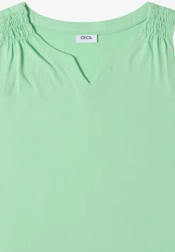 Top en couleur unie à encolure fendue