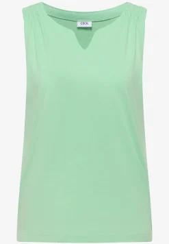 Top en couleur unie à encolure fendue