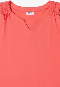 Top en couleur unie à encolure fendue