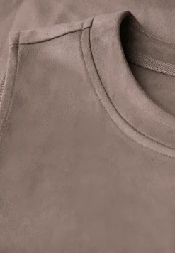Top en velours avec coutures décoratives