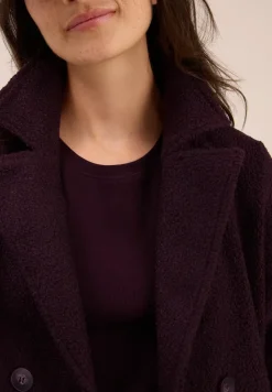 Trench-coat avec incrustation