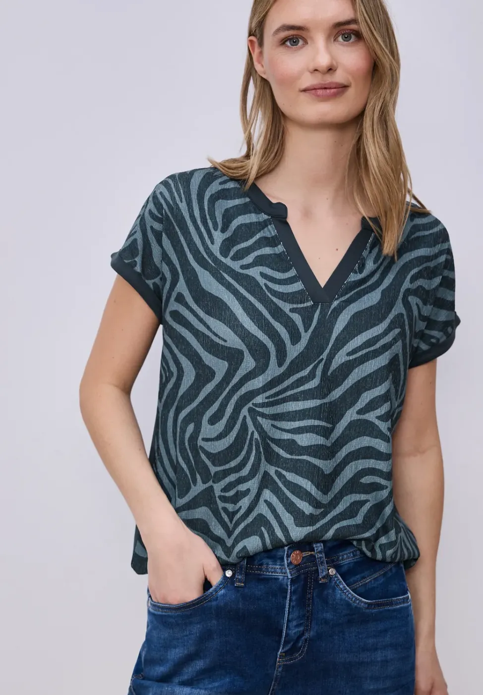 T-shirt à encolure fendue et ourlet élastique