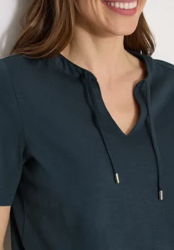 T-shirt à manches courtes avec col fendu