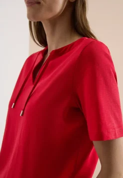 T-shirt à manches courtes avec col fendu