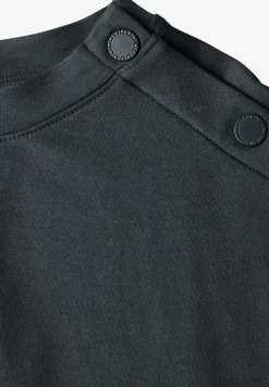 T-shirt avec détail de boutons