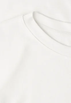 T-shirt basique à la coupe raccourcie