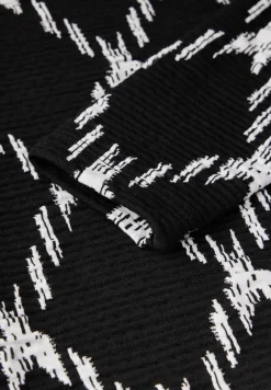 T-shirt structuré avec motif à carreaux