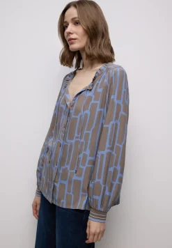 Tunique à motifs avec tape