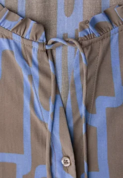 Tunique à motifs avec tape