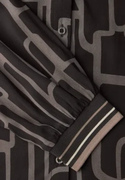 Tunique à motifs avec tape