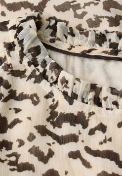 Tunique en mousseline de soie à motifs