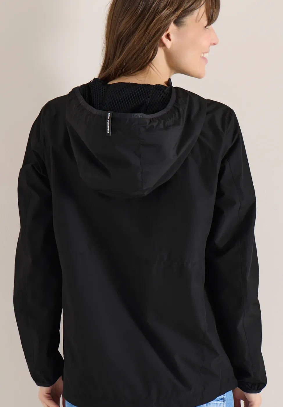 Veste avec capuche et cordon de serrage