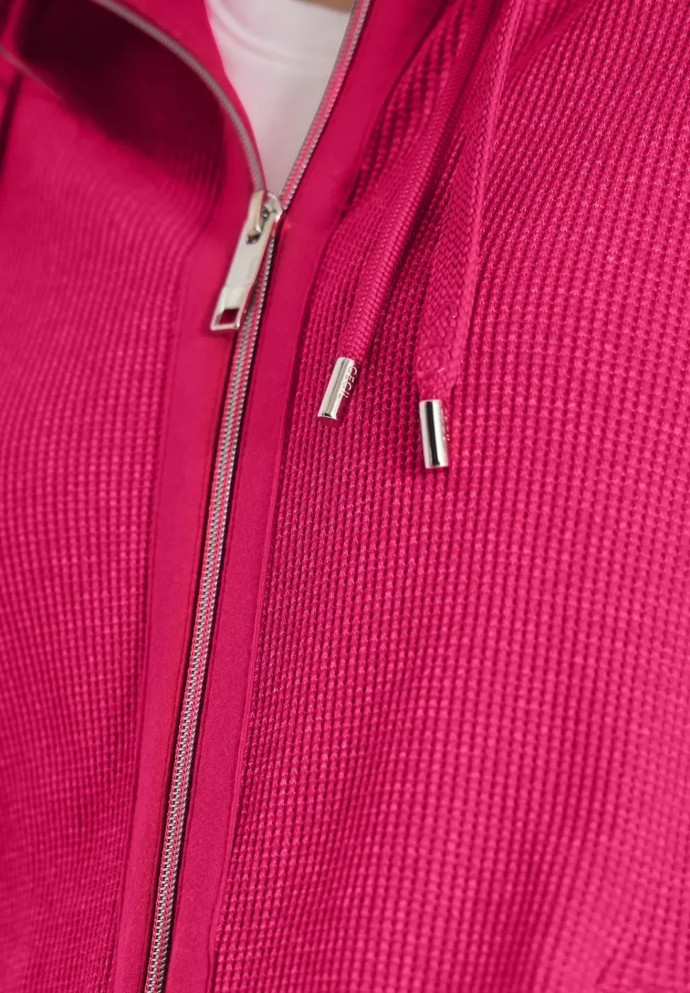 Veste avec capuche et motif à rayures