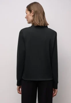 Veste avec cordon de serrage