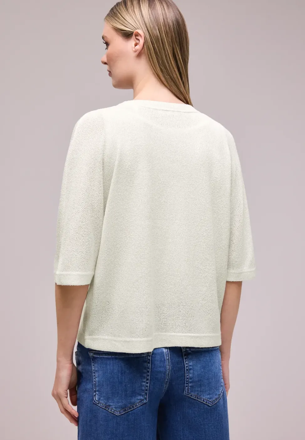 Veste en maille pailletée à manches courtes