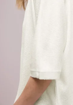 Veste en maille pailletée à manches courtes