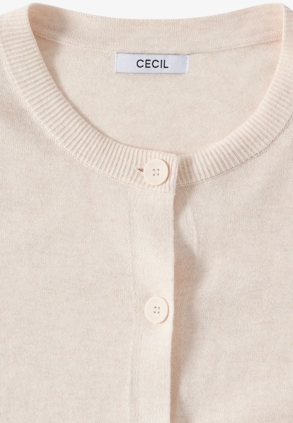 Veste en tricot avec patte de boutonnage