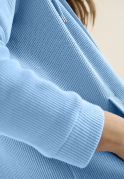 Veste à manches longues avec capuche et poches