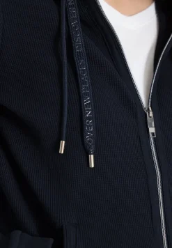 Veste à manches longues avec capuche et poches