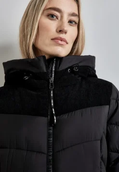 Veste à structure mixte