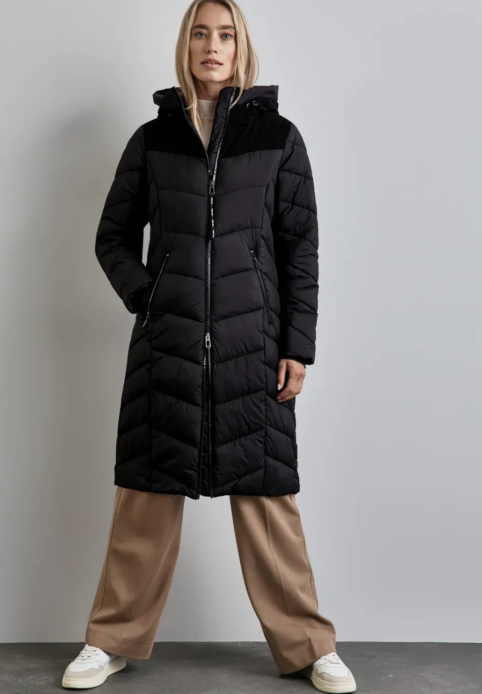 Veste à structure mixte